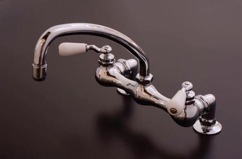 Strom Living - Madeira Kitchen Faucet with Arched Swivel Spout and Porcelain Lever Handles